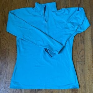 Nike, women’s size large. Fitted zip. Bright blue color